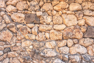 abstract background of an old stone wall close up