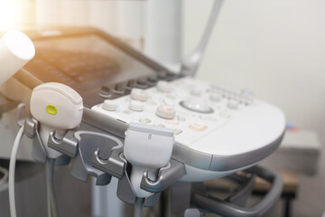 Medical ultrasound machine with linear probes in a hospital diagnostic room. Modern medical...