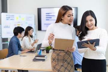 Diverse colleagues working together in a business organization. Group of young startup entrepreneurs.