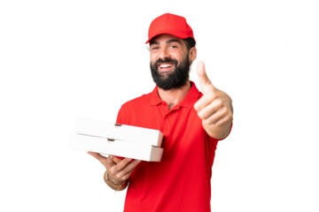 Pizza delivery man with work uniform picking up pizza boxes over isolated chroma key background with thumbs up because something good has happened