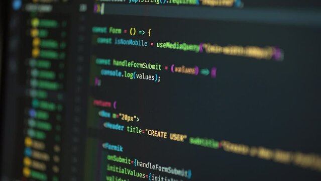 Developer is browsing html code on the computer screen. HTML Web Page Code Scrolling Programming code abstract technology background for software developer and Computer script concept