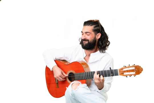 Young man with beard with guitar over isolated chroma key background - Powered by Adobe