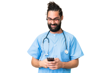 Young doctor man over isolated chroma key background sending a message with the mobile