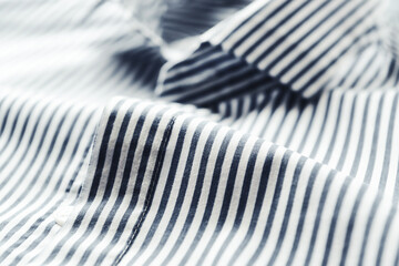 Close up of men's striped shirt. Copy space.	