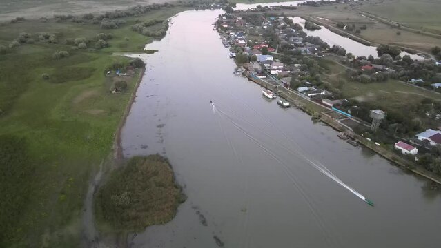 Drone view over the tiny village Mila 23 on the Danube river