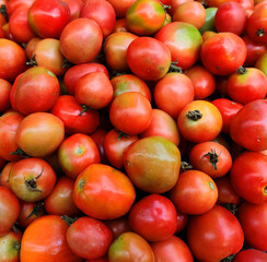Tomatoes background, fresh tomatoes in the market.