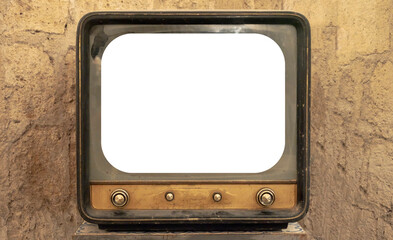 A retro vintage TV from the 1940s (wartime television), showing a convex screen (blank cutout). Location: old room with stone walls. Front shot.
