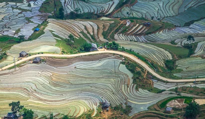 Gordijnen Rijstvelden Terraced fields to prepare water for rice cultivation in Vietnam  © QUY TRAN