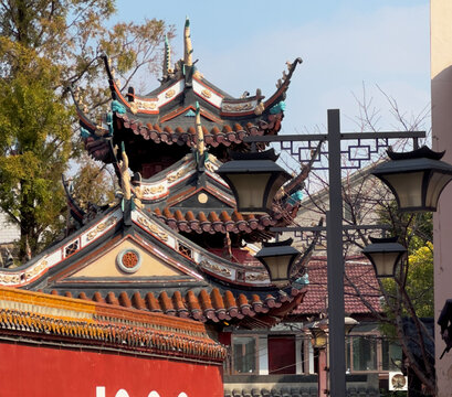 The rooflines of a small temple in the village of Zhude in Minhang district of Shanghai - a sunny day view