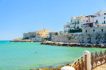 Vieste, Italy. View of the houses near Marina Piccola. In the distance the Church of San Francesco. September 5, 2022.