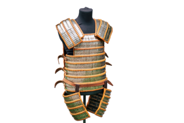 Medieval vintage armor and retro warrior chain mail, isolated on a white background. Reconstruction of the events of the Middle Ages in Europe.