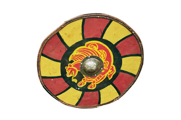 Red vintage shield with yellow animal lion a medieval warrior, isolated on a white background. Reconstruction of the events of the Middle Ages in Europe