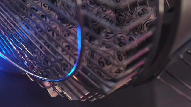 Balls with numbers rotate in a lottery machine