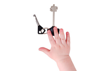 Baby toddler boy holding a house key in his hand, isolated on a white background. Child with apartment keys, close-up