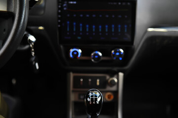 The process of choosing climate control in the car. Various controls in auto switches. Modern car interior