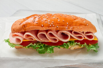 Sandwich submarine, on a white table, close-up, no people, horizontal, homemade,