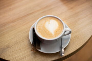 coffee with milk and heart on coffee
