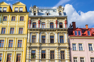 Front facade of yellow historic buildings in Liberec, Czech Republic