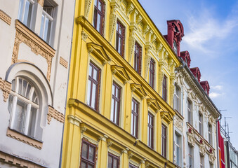 Fototapeta na wymiar Yellow facade of a historic house in Liberec, Czech Republic