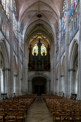 Fototapeta premium view of the central nave and church organ inside the Troyes Cathedral