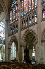 Obraz premium interior view of the historic Troyes Cathedral with stained glass windows and Gothic architecture