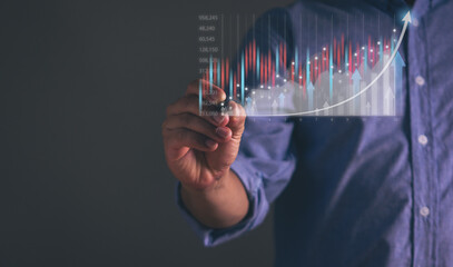 Businessman drawing growing virtual hologram, Business growth, progress or success concept, analyzing graph financial data.