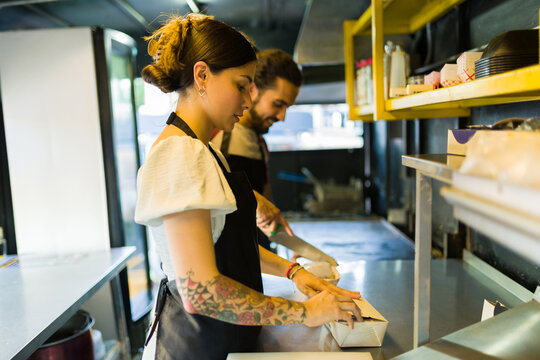 Food Truck Workers Working Preparing Street Food