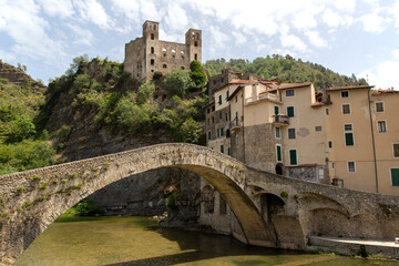 Fototapeta na wymiar Dolceacqua panorama with the ancient roman bridge made of stones and the castle