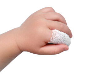 Baby s hand with a bandaged finger on a isolated white background, copy space. Injured index finger of a child wrapped in a white bandage. Kid boy aged one year and three months