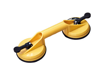 Yellow handheld device with vacuum suction cups for lifting floor panels, isolated on a white...