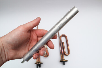 Copper Tubular Heating Element for Electric Water Heater, Electric Water Boiler. Hand holding New...