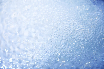 Blue water texture. Bubbles and bubbling water.