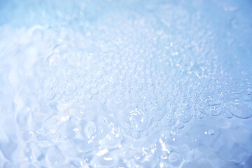 Blue water texture. Bubbles and bubbling water.