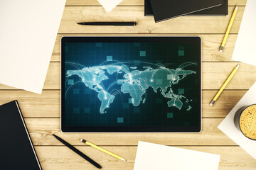 Modern digital tablet display with abstract graphic world map with connections, globalization concept. Top view. 3D Rendering