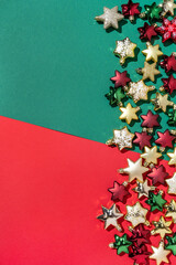 Christmas fir toys on red and green background. Merry Christmas and Happy New Year concept