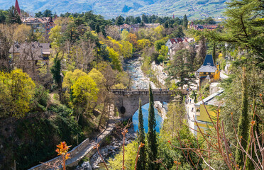 Merano (Meran) in South Tyrol: panoramic view of the Passer river  as seen from Tappeinerweg- Trentino Alto Adige, northern Italy - obrazy, fototapety, plakaty