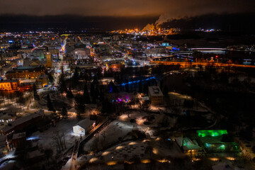 Naklejka premium Aerial drone photo of downtown Oulu Finland Night Cityscape in Winter