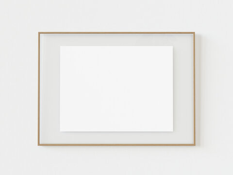 Wooden landscape photo frame portrait with white paper on white wall background. Empty white picture frame mockup template isolated on white wall indoors. 3d illustration