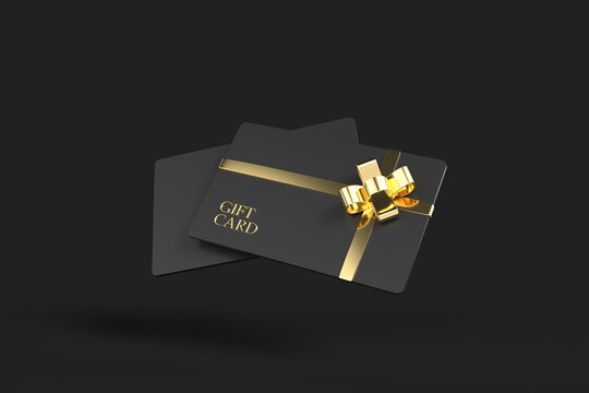 Luxury privilege gift cards with a golden ribbon for loyalty membership on a dark background. 3D rendering isolated with clipping path.