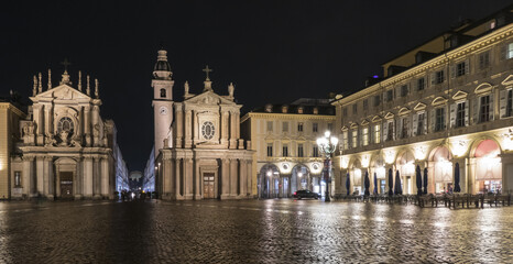 Fototapeta na wymiar The beautiful San Carlo Square illuminated at night