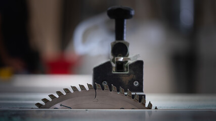 Saw blade for cutting wood in the machine used in industrial building.