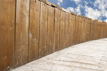 Abstract background of old wooden planks against a beautiful sky