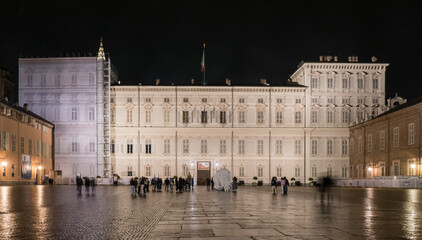 The beautiful Castle Square in Turin with the Royal Palace illuminated at night