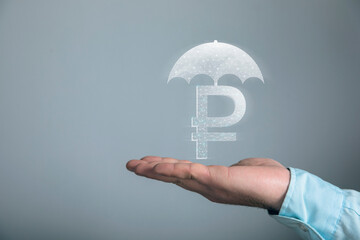 Ruble under an umbrella from the network.