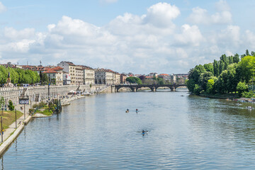 The murazzi on the river Po in Turin with the buildings reflected in the water