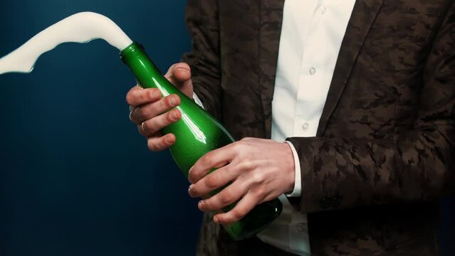 Super slow motion of Champagne explosion, opening champagne bottle closeup. Celebration of xmas christmas and new year holidays. Joyful party concept. Filmed on high speed camera, 1000fps. Copy space