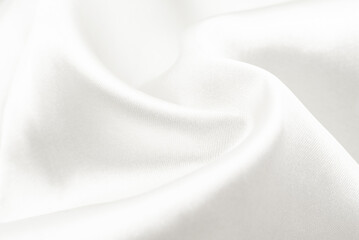 White silk fabric. Texture of white chintz fabric with waves and rumples
