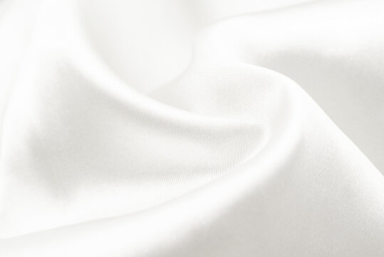 White Silk Fabric. Texture Of White Chintz Fabric With Waves And Rumples