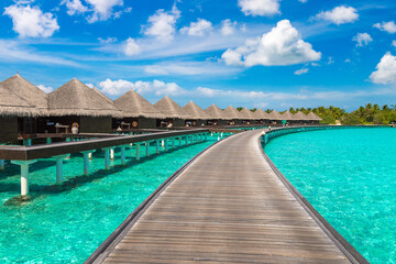 Fototapeta na wymiar Water Villas (Bungalows) in the Maldives
