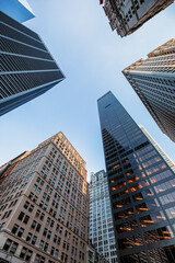 Fototapeta na wymiar Bottom view of glass skyscrapers in New York 